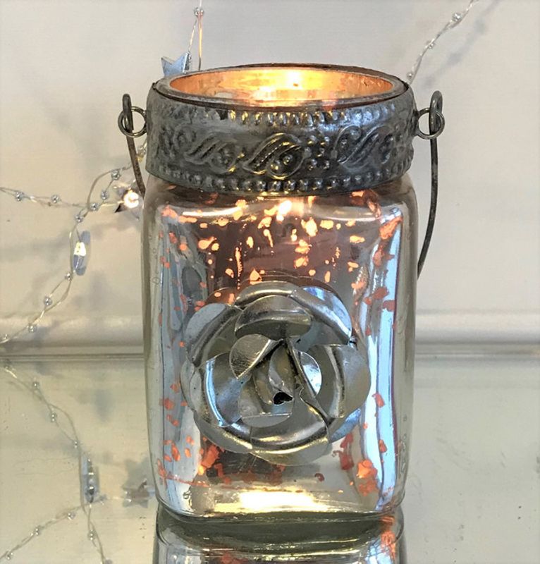 Telysholder sølv, med metallblomst.